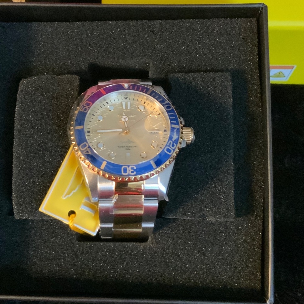 Invicta Silver Watch with Blue Bezel